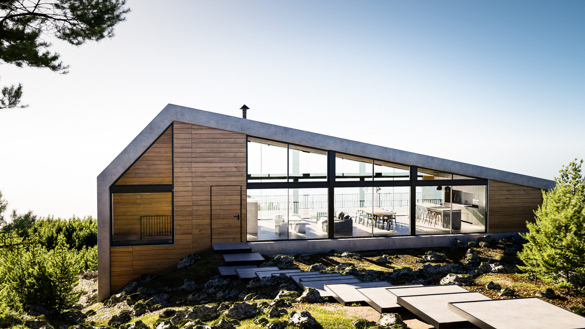 "Fachada exterior de Casa Tapalpa con madera y ventanales sobre terreno rocoso"