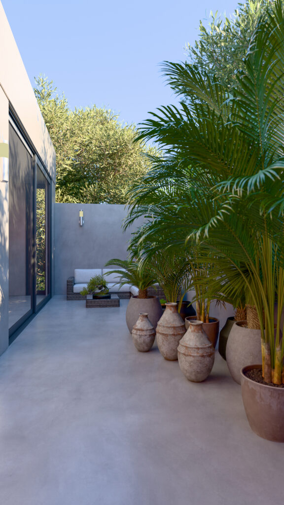 Patio interior acristalado con árbol central funcionando como núcleo de iluminación natural para la casa