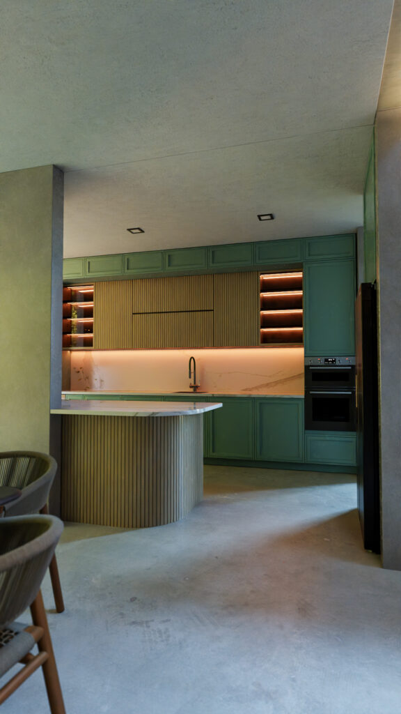 Cocina de diseño con gabinetes verdes, isla con base de madera acanalada y acabados de concreto