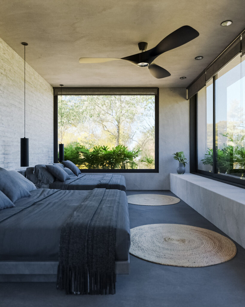 Habitación doble en tonos oscuros con ventanales panorámicos y pisos de concreto pulido en Tulum
