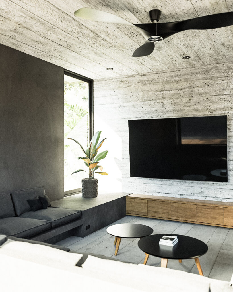 sala hundida con techo de concreto aparente, lámparas de mimbre y vista directa a la alberca