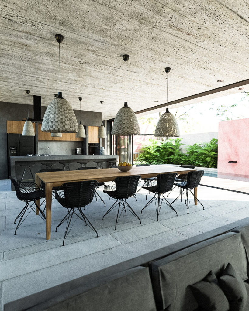 Comedor abierto con techo de concreto aparente, lámparas de mimbre y vista directa a la alberca"