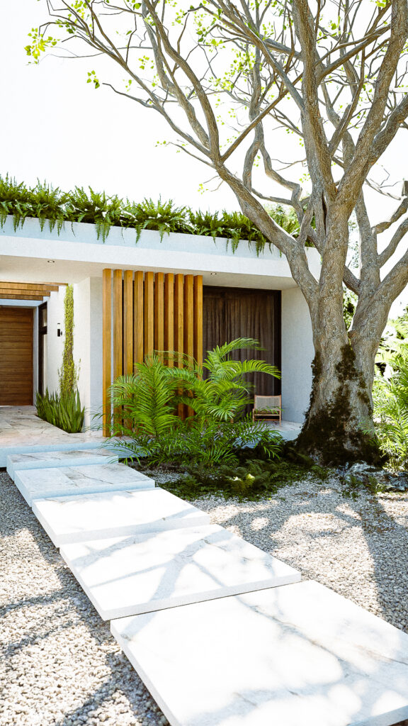 Fachada principal con listones de madera verticales, piedra Galarza y árbol monumental