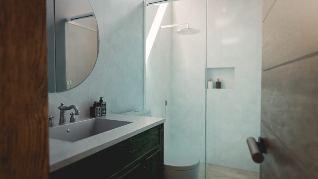 baño y regadera con iluminación natural y de estilo industrial en Casa Roma
